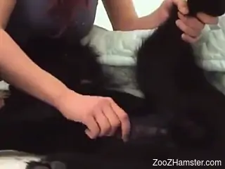 Mask-wearing redhead getting throated by a black dog