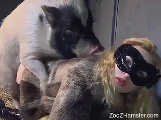 Masked blonde feels entire dog dick in her ass