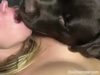 Masked zoophile enjoying hot sex with a black dog