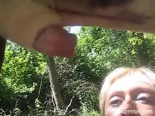 Aroused mature slut gets personal with her dog's cock