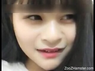 Asian cutie loves to involve the dog in her sexual kinks