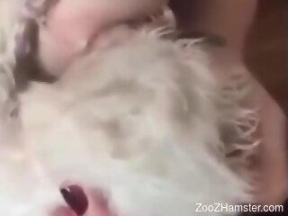 Aroused woman gets sexually intimate with her furry dog