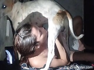 Naked slut films herself sucking the dog's dick with grace